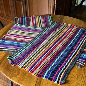 A BUNDLE OF THREE 19 x 30 MULTI-COLORED BRAIDED RUGS IN GOOD USED CONDITION